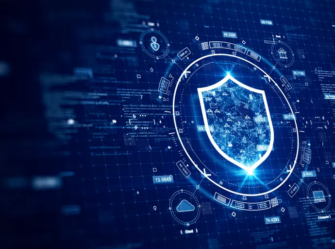 A cybersecurity professional monitoring university data protection on a digital screen, ensuring student privacy and online safety.